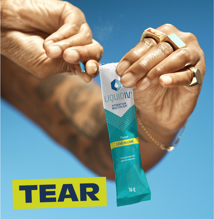 women is opening electrolyte powder sachet